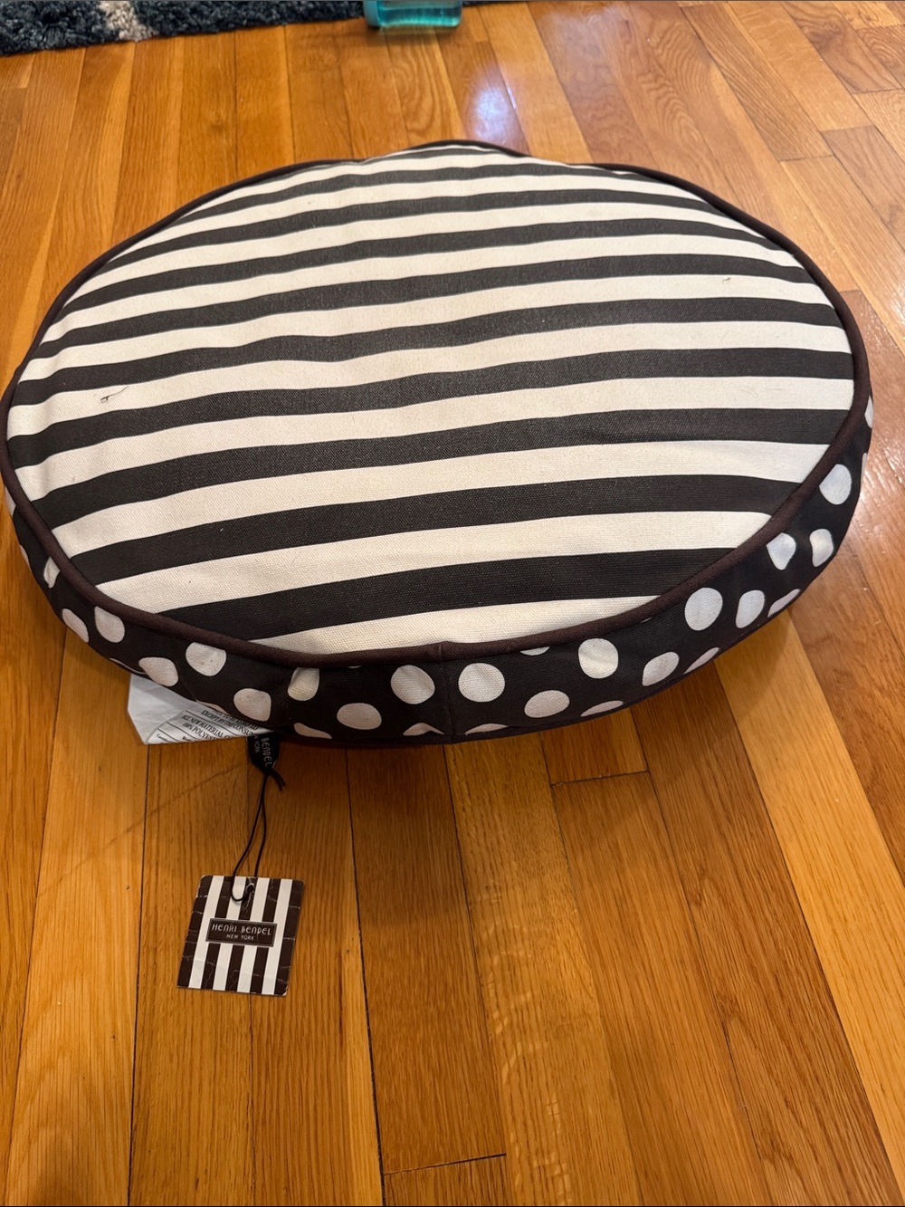henri bendel Brown and White Polka Dot Round Dog Bed sleeping in stripes